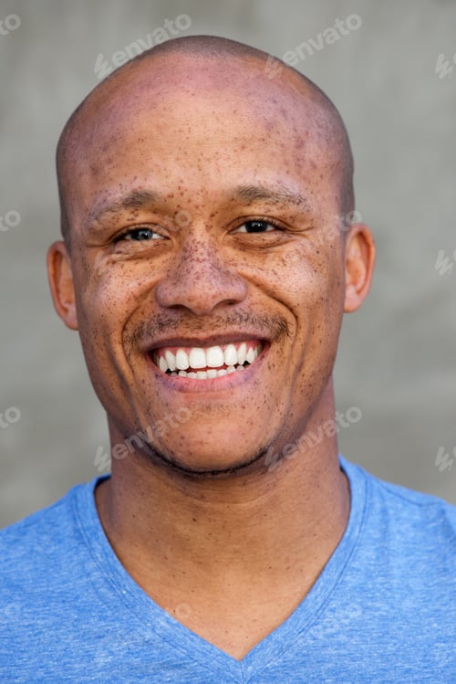 Preview: handsome bald african man laughing