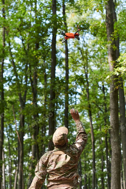Preview: Elite military unit, equipped with state-of-the-art technology including a drone, strategically