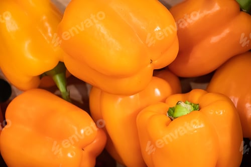 Preview: Yellow bell pepper at a farmers market. Vegetables for a healthy diet.