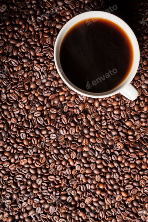 Preview: Coffee cup on coffee beans