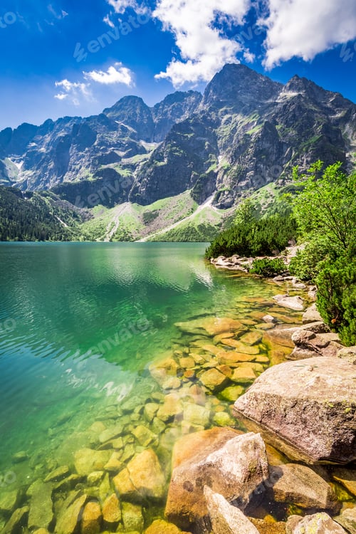 Preview: Beautiful pond in the mountains at sunrise in Poland