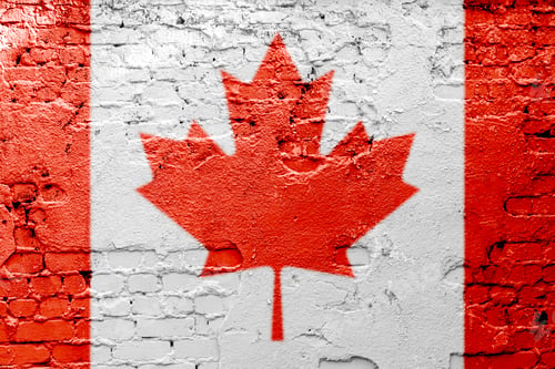 Preview: a graffiti of national flag of canada painted on the rusty wall
