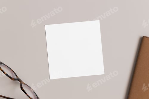 Preview: Invitation square card mockup with a glasses and a notebook. Workspace concept.
