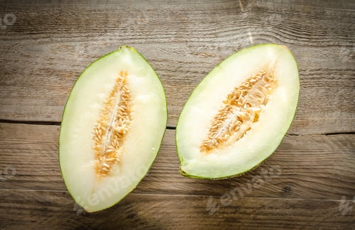 Preview: Piel De Sapo Melon On The Wooden Background