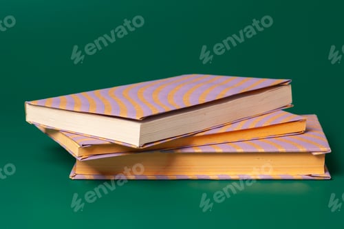 Preview: books isolated on green background