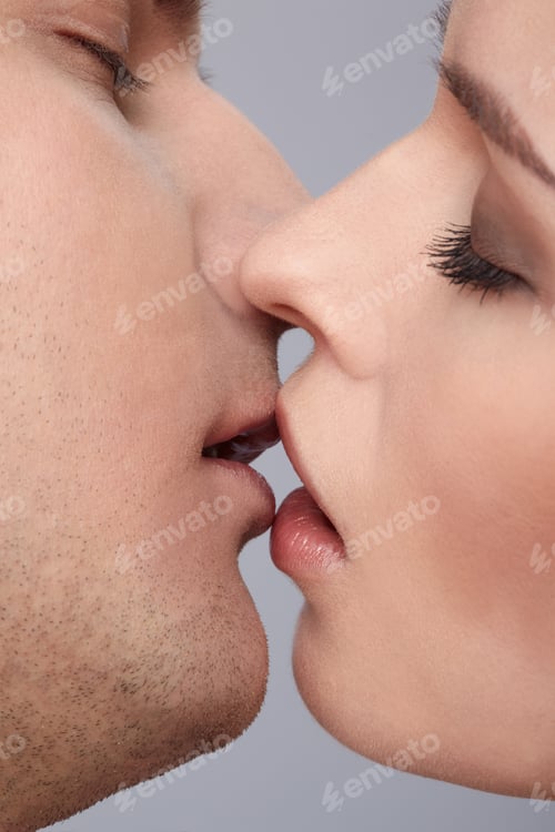Preview: Close Up Portrait Of Young Caucasian Couple Kissing