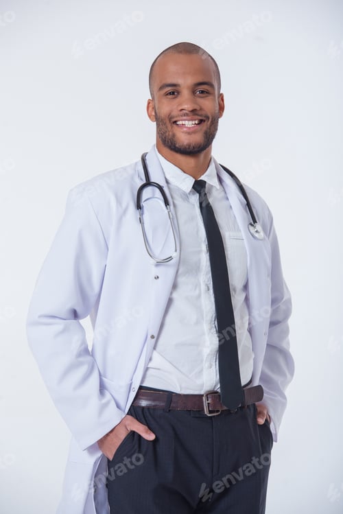 Preview: Smiling Physician Poses Confidently in Hospital Setting