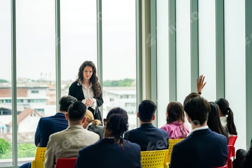 Preview: Group of businesspeople attending a seminar