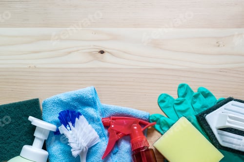 Preview: House cleaning tools on wooden background