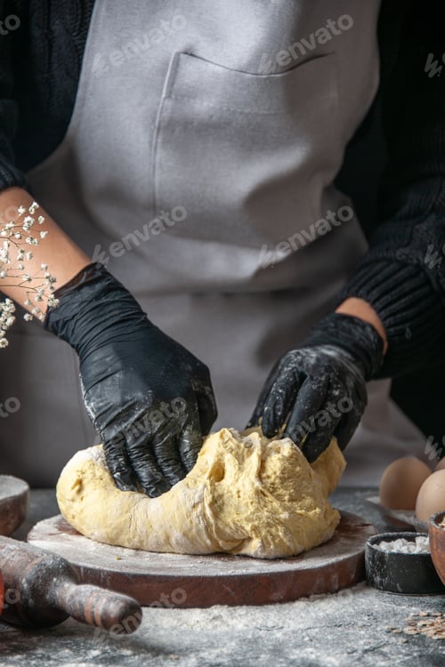 Preview: front view female cook rolling out dough on dark background cuisine job pastry hotcake bakery eggs