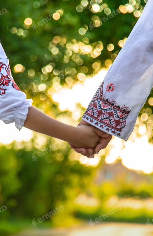 Preview: Ukrainian grandmother and granddaughter in vyshyvanka. selective focus.