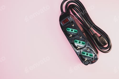 Preview: Black surge protector on a light pink background