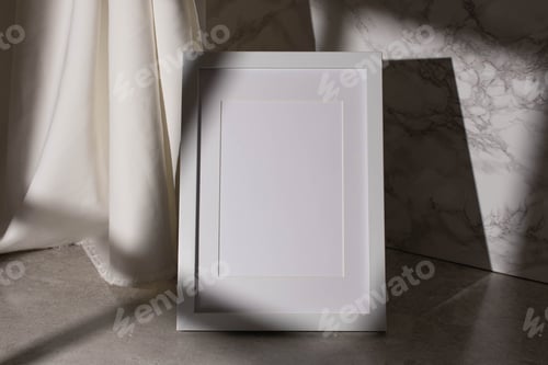 Preview: Close up of a white mockup blank on a new Stucco wall with a shadow and sunlight, ceramic floor