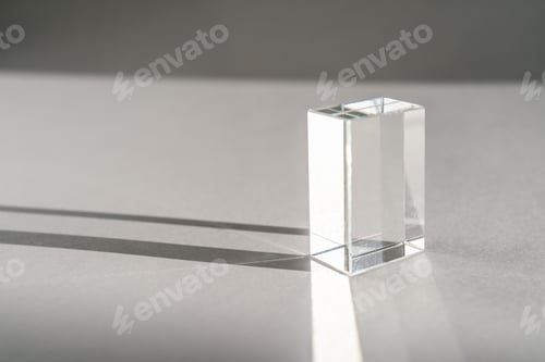 Preview: Transparent crystal prism on a white background.
