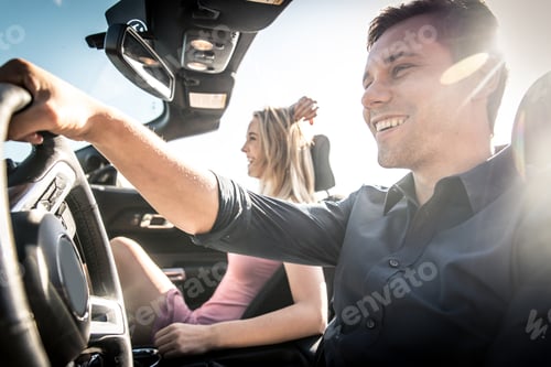 Preview: Couple on convertible car