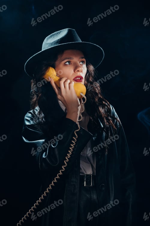 Preview: Dark noir portrait of a female detective holding a retro telephone receiver.
