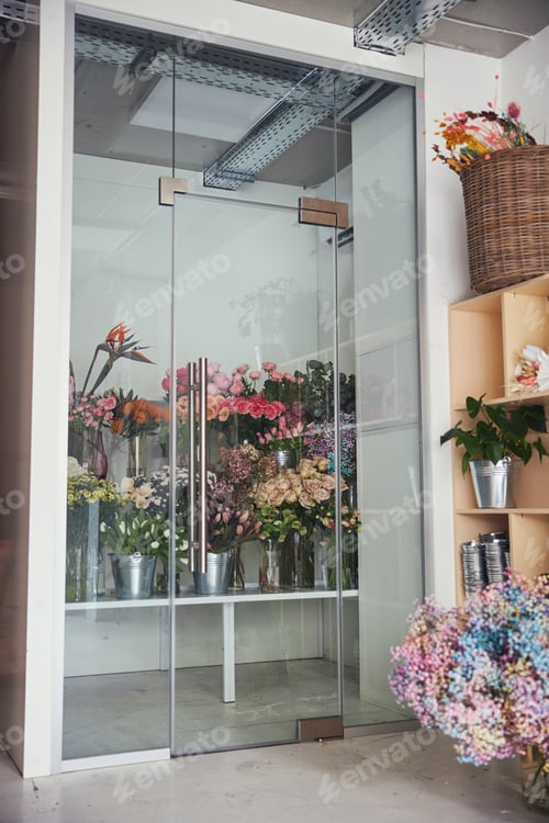 Preview: Bunches of gorgeous multi-colored fresh spring flowers in a florist shop