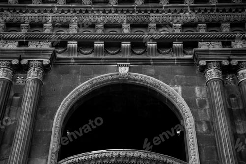 Preview: Grayscale closeup shot of a stone decorative arch