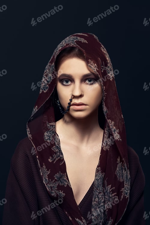 Preview: Portrait of a girl in bathrobe with hood
