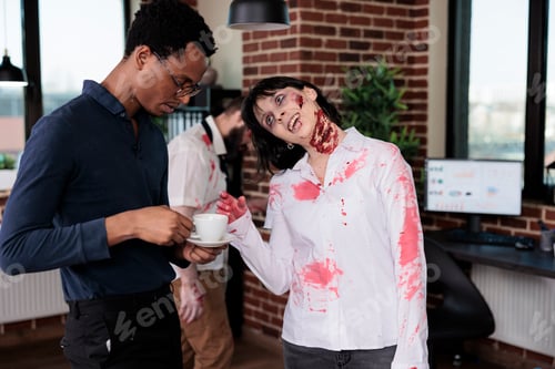 Preview: Spooky evil zombie talking to man at workplace
