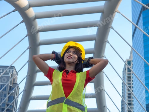 Preview: Foreman engineer female businesswoman manager wear safety work job report look at camera site projec