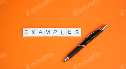 Preview: Bold Examples Concept on Orange Background with Pen