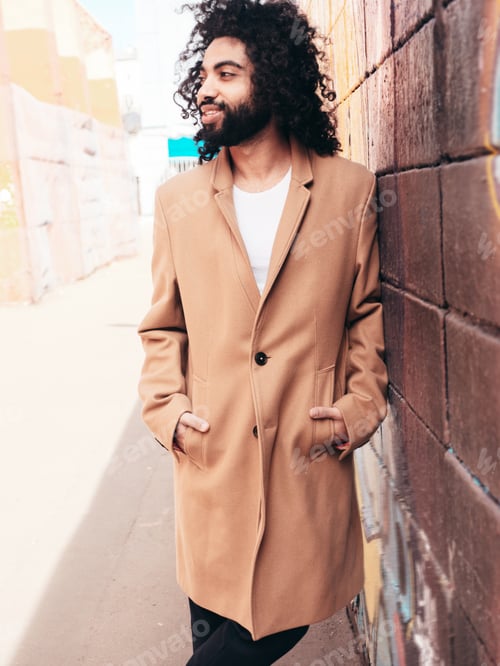 Preview: Handsome man posing outdoors