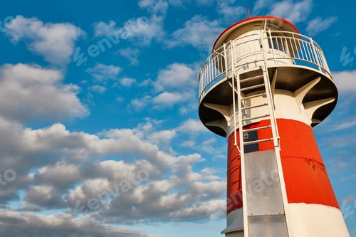 Preview: Red and white picturesque lighthouse in Faroe islands, Torshavn harbor