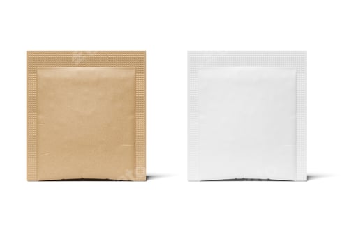 Preview: Brown and white paper sugar square packs isolated. 3D rendering.