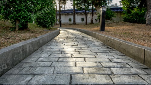 Preview: Paving stone road. Old pavement of square cobblestone sidewalk.