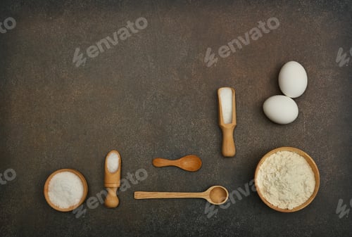 Preview: Flat lay of baking ingredients on table