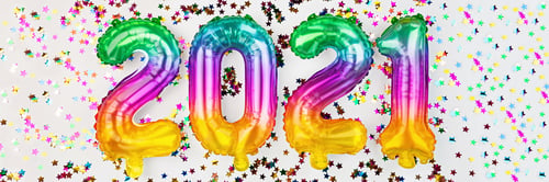 Preview: Happy new year 2021 rainbow numbers, flat lay on white background. Celebrating winter holidays