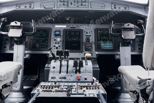 Preview: Knobs and buttons. Close up focused view of airplane cockpit