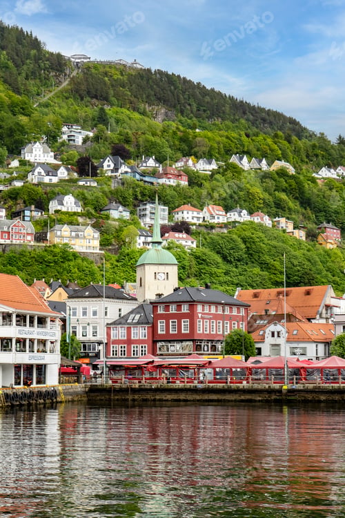 Preview: Vertical shot of Fish Market scene in Bergen with Mount Floyen behind
