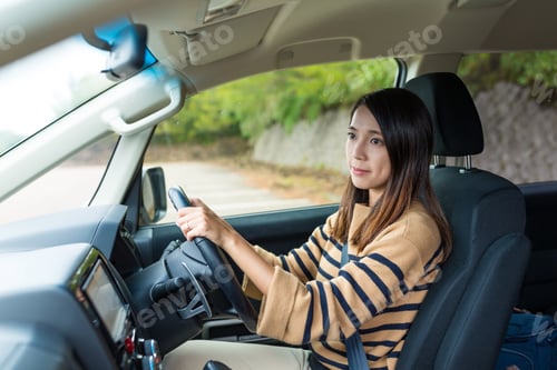 Preview: Woman driving a car