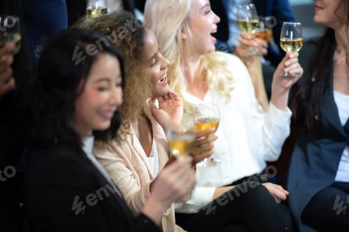 Preview: Business partners toast champagne company event celebration success
