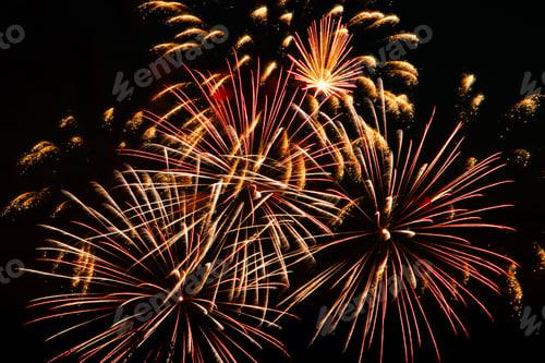 Preview: Bright colored fireworks on a festive night. Explosions of colored fire in the sky.