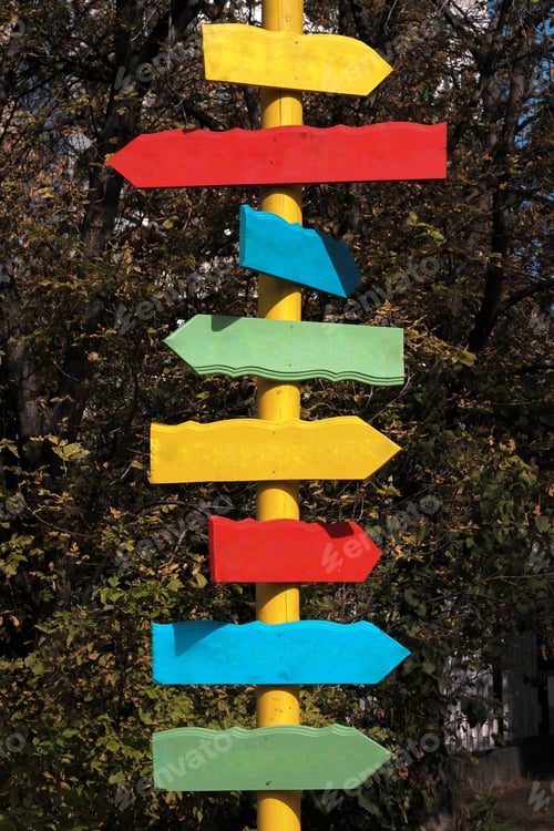 Preview: Colorful directional arrows on signpost