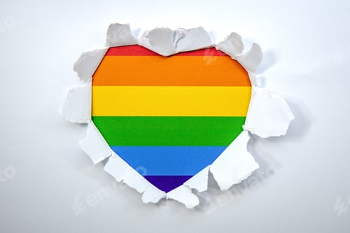 Preview: Hole in paper with heart shape and lgbt gay colors