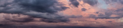 Preview: Cloudscape during a dark, rainy and colorful morning sunrise