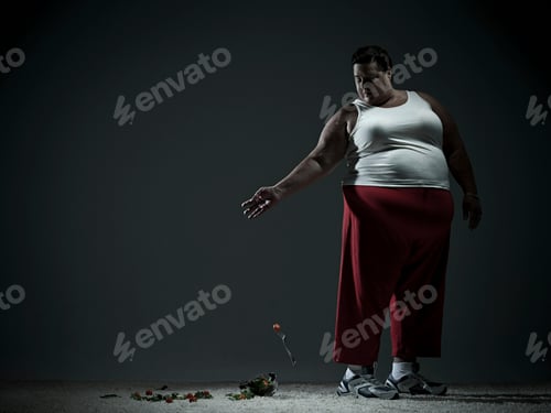 Preview: Solitary figure watches a flower drop against a somber backdrop