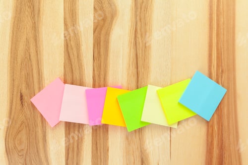 Preview: Blank sticky paper note on wall