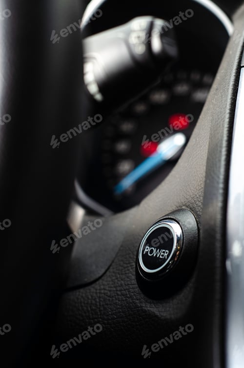 Preview: Start stop engine button on a modern car dashboard