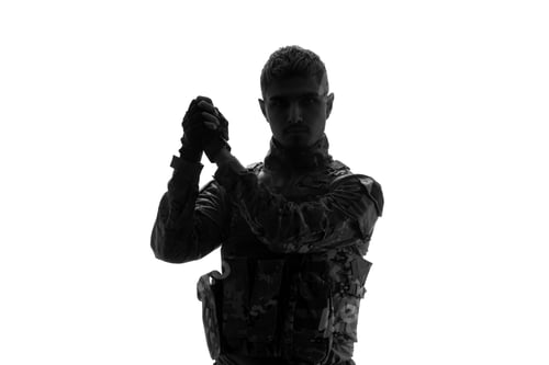 Preview: soldier silhouette serious handsome strong tough army soldier in uniform holding hands together