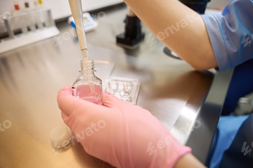 Preview: Embryologist performing cryopreservation work in a specialized lab