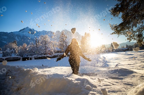Preview: woman having fun in winter snow