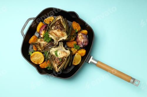 Preview: Concept of tasty food with grilled artichoke, top view