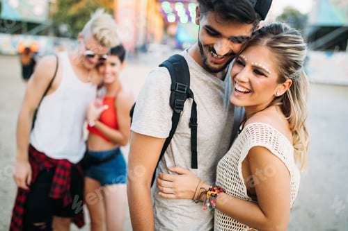 Preview: Group of friends having fun time at music festival