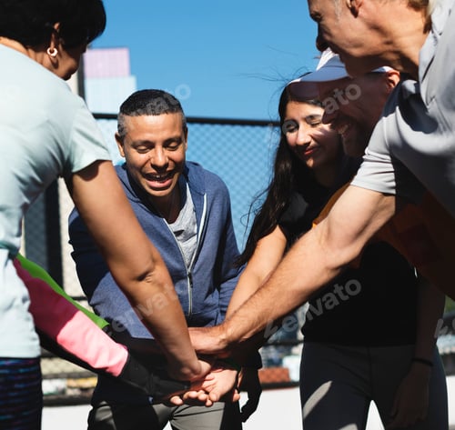 Preview: People exercising at fitness gym
