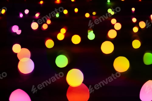 Preview: Abstract festive texture with bokeh light garland and christmas lights